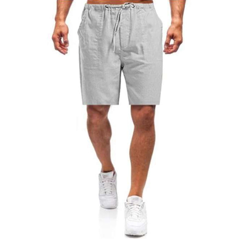 "Mäns linne shorts med lös passform, beige, elastiskt midjeband och dragsko, idealiska för sommardagar."