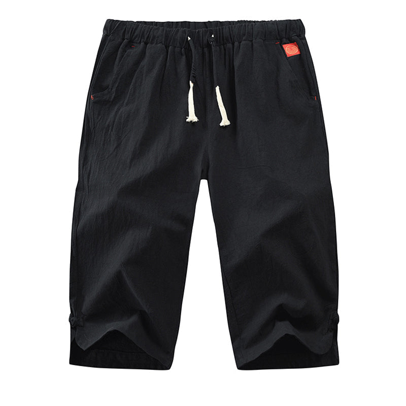 "Mäns sommar linnebyxor med dragsko, sidofickor, i lös haremstil, ljusbeige bomullslinne för vardag och strand."