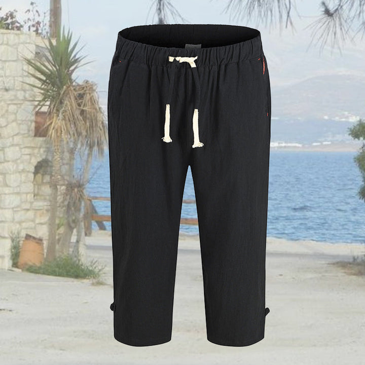 "Mäns sommar linnebyxor med dragsko, sidofickor, i lös haremstil, ljusbeige bomullslinne för vardag och strand."