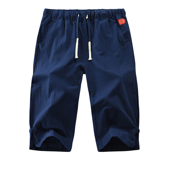 "Mäns sommar linnebyxor med dragsko, sidofickor, i lös haremstil, ljusbeige bomullslinne för vardag och strand."