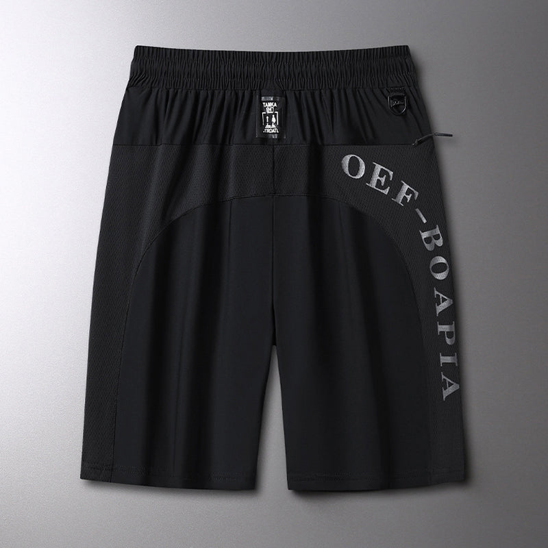 "Mäns sommar sportshorts med elastisk midja, avslappnad passform, svart färg, framifrån, lämplig för träning och vardag."