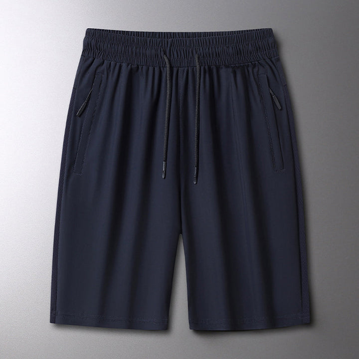 "Mäns sommar sportshorts med elastisk midja, avslappnad passform, svart färg, framifrån, lämplig för träning och vardag."