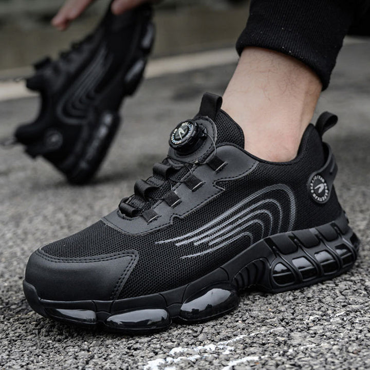 "Mäns svart säkerhetssko med ståltå och roterande knapp, tålig sula, idealisk för industrimiljö, erbjuder komfort och skydd."