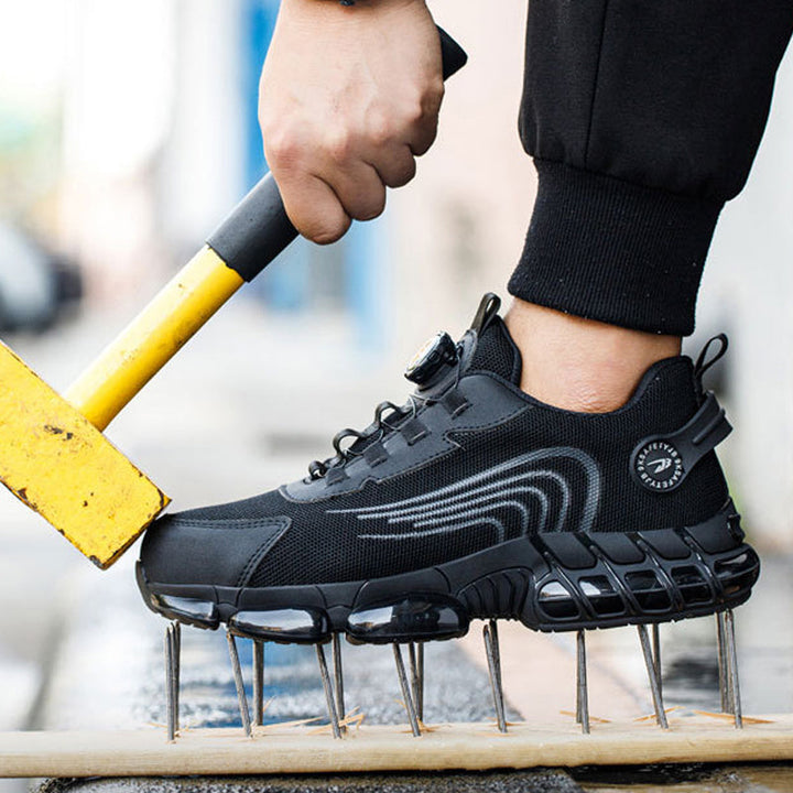 "Mäns svart säkerhetssko med ståltå och roterande knapp, tålig sula, idealisk för industrimiljö, erbjuder komfort och skydd."