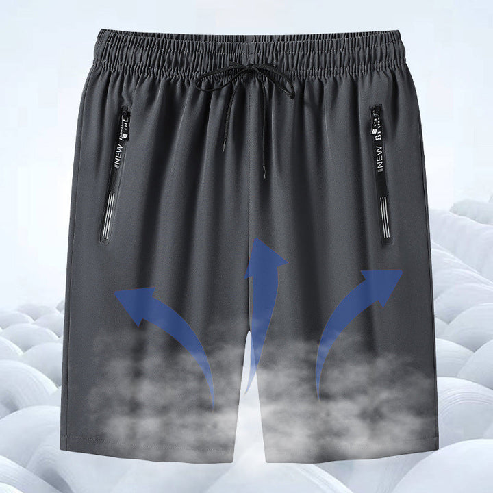 "Meshshorts för män i lätt material med elastiskt midjeband och fickor, perfekt för sommarens aktiva dagar."