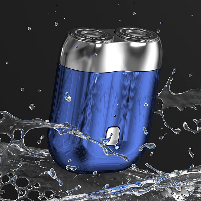 "Mini elektrisk rakapparat för män, bärbar, vattentät, kompakt design med rostfria stålblad och elegant finish."