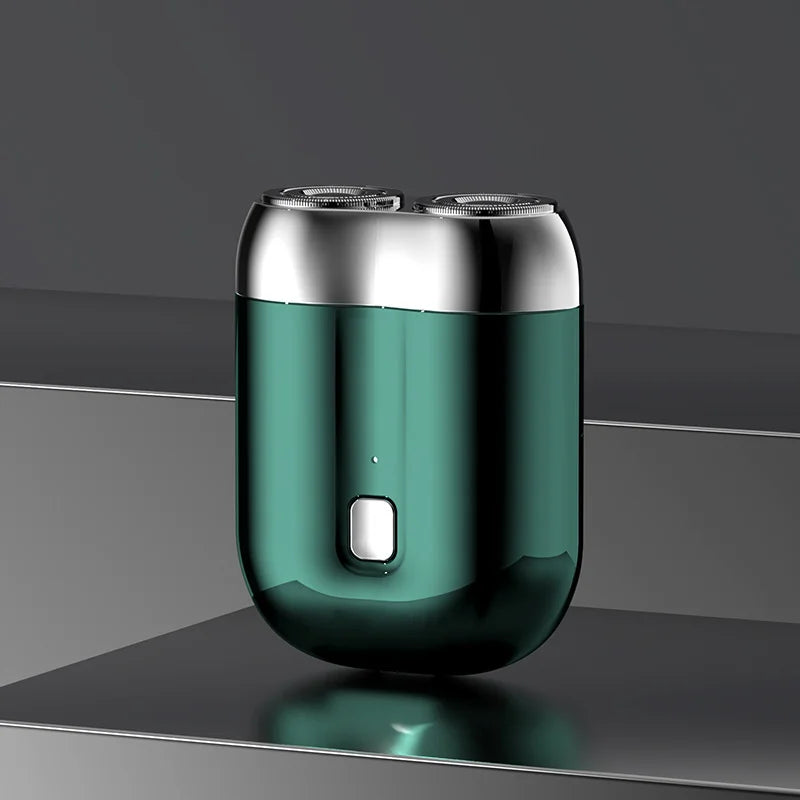 "Mini elektrisk rakapparat för män, bärbar, vattentät, kompakt design med rostfria stålblad och elegant finish."