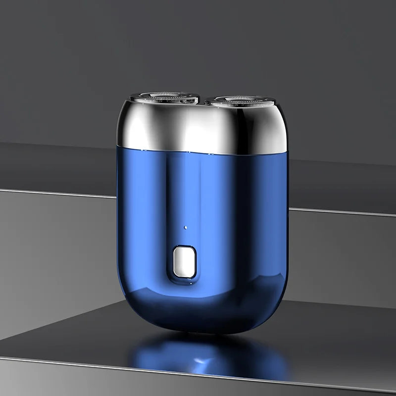 "Mini elektrisk rakapparat för män, bärbar, vattentät, kompakt design med rostfria stålblad och elegant finish."