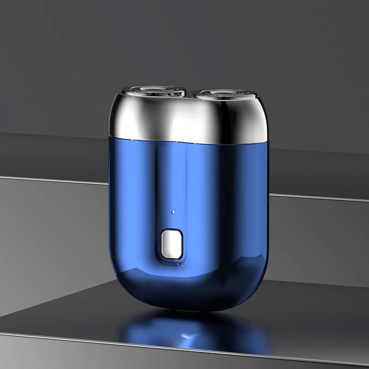 "Mini elektrisk rakapparat för män, bärbar, vattentät, kompakt design med rostfria stålblad och elegant finish."