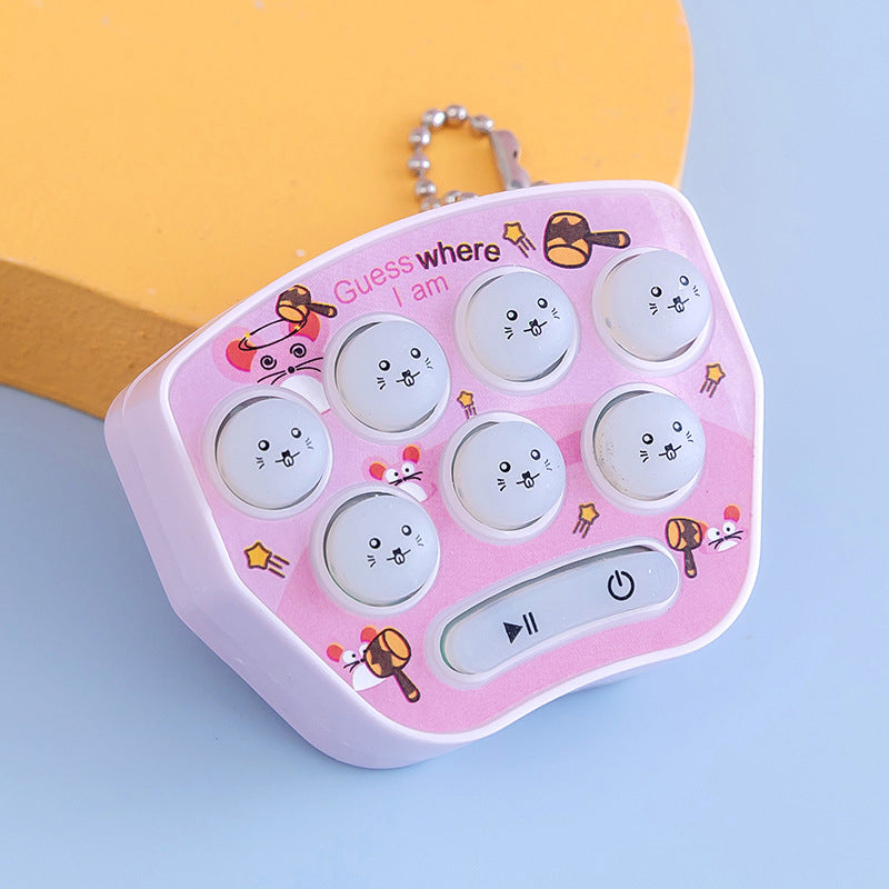 "Mini Jordekorre-spel för barn, elektronisk leksak i blått, rosa, lila eller grönt. Perfekt för hand-öga-koordination."