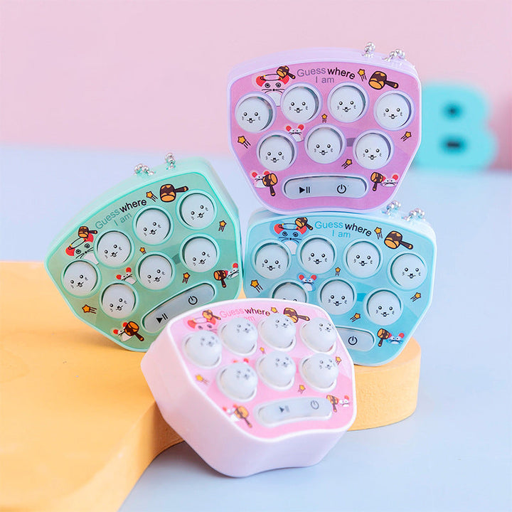 "Mini Jordekorre-spel för barn, elektronisk leksak i blått, rosa, lila eller grönt. Perfekt för hand-öga-koordination."