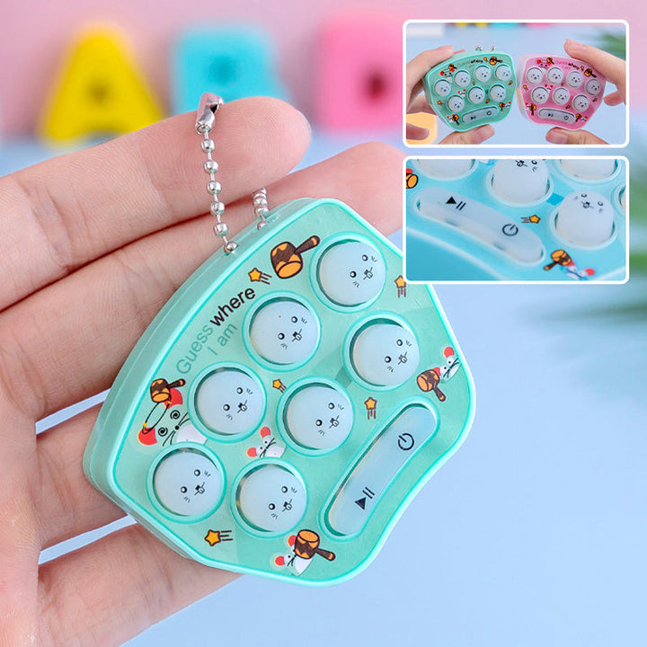 "Mini Jordekorre-spel för barn, elektronisk leksak i blått, rosa, lila eller grönt. Perfekt för hand-öga-koordination."