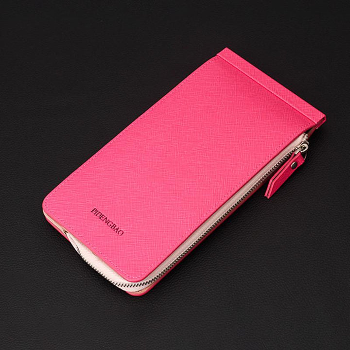 "Multifunktionell plånbok med RFID-skydd, eleganta färger, rymmer 26 kort, lätt och kompakt för modern användning."