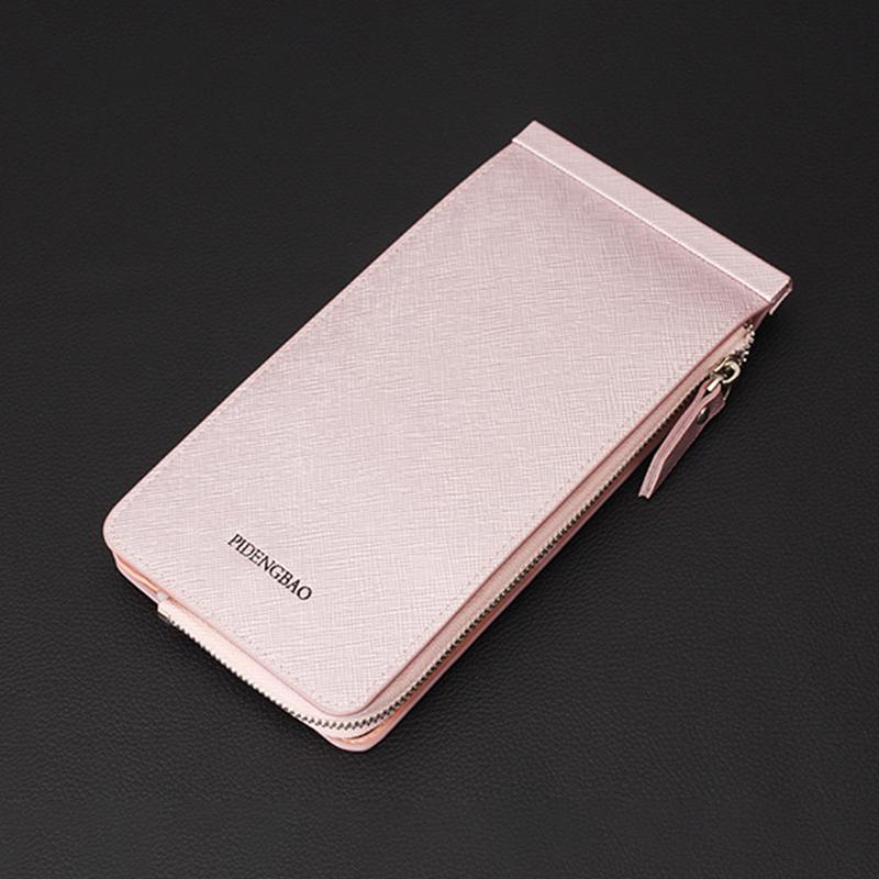 "Multifunktionell plånbok med RFID-skydd, eleganta färger, rymmer 26 kort, lätt och kompakt för modern användning."