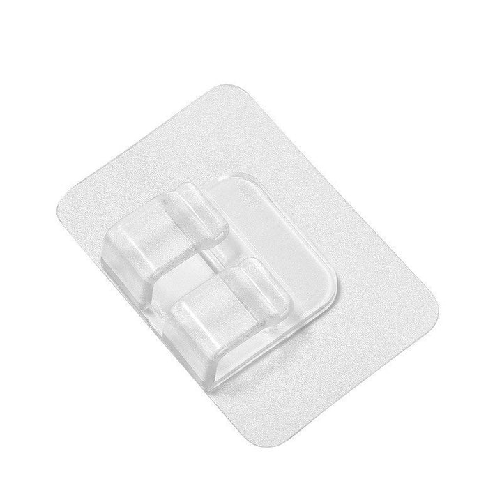 "Multifunktionella spännen fixerar bilmattor säkert, transparent och utan spår, med stark vidhäftning, 4x6cm, 5g."