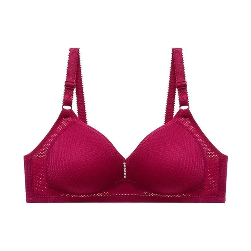 "Plus size bekväm trådlös bh för kvinnor med justerbart band, sömlös design i beige med elastiskt, justerbart band."