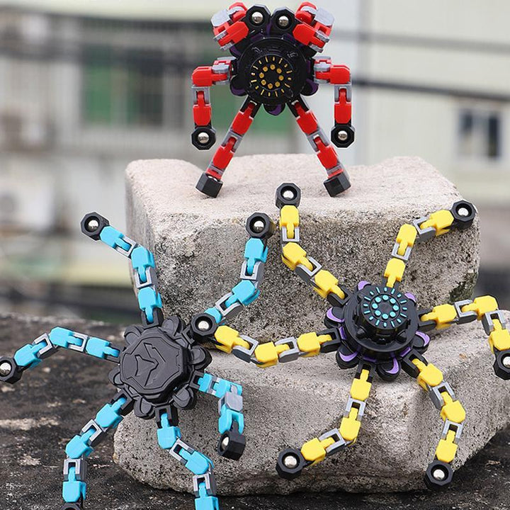 "Röd plast fidget spinner med sugkopp, färgglad och ergonomisk design för barn och vuxna, perfekt för stresslindring."