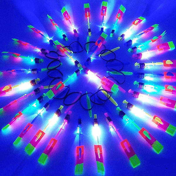 Rolig flygande raket slangbella för barn med LED-ljus, av plast, färgglad ljuseffekt, miljövänlig leksak.