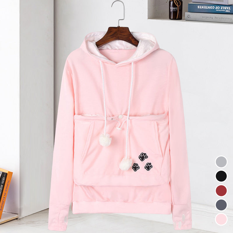 "Rosa damhuvtröja med känguruficka i mjuk bomullsblandning, perfekt för att bära ett husdjur nära bröstet."