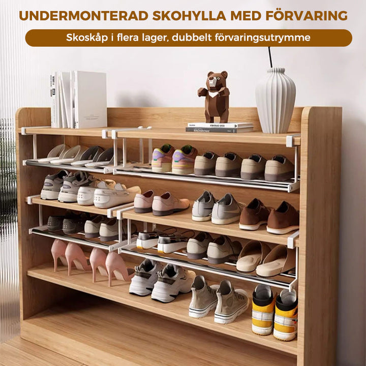 "Skoskåp i metall, svart och vit, med skiktad design för optimal hushållsorganisation och elegant förvaring."