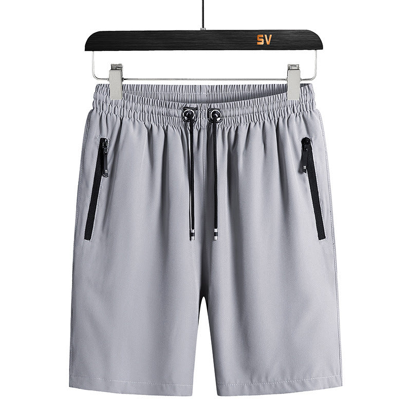 "Snabbtorkande herrshorts för stranden med sportlinjeformad design, fantastisk elasticitet och ventilerande material."