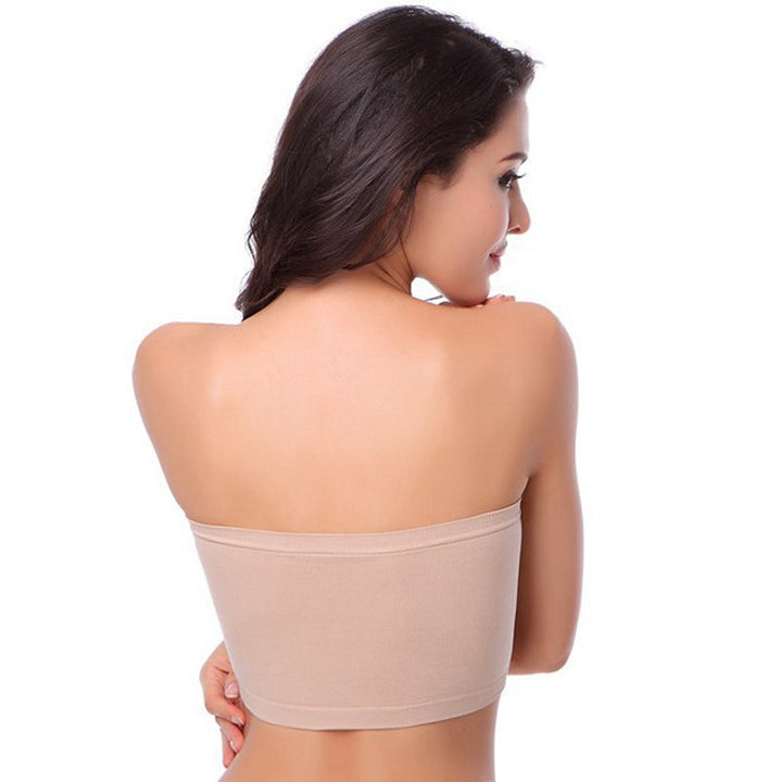 "Sömlös bandeau BH för damer, beige nylon och bomullsblandning, avtagbart skumfoder, breda sidovingar för komfort och stöd."