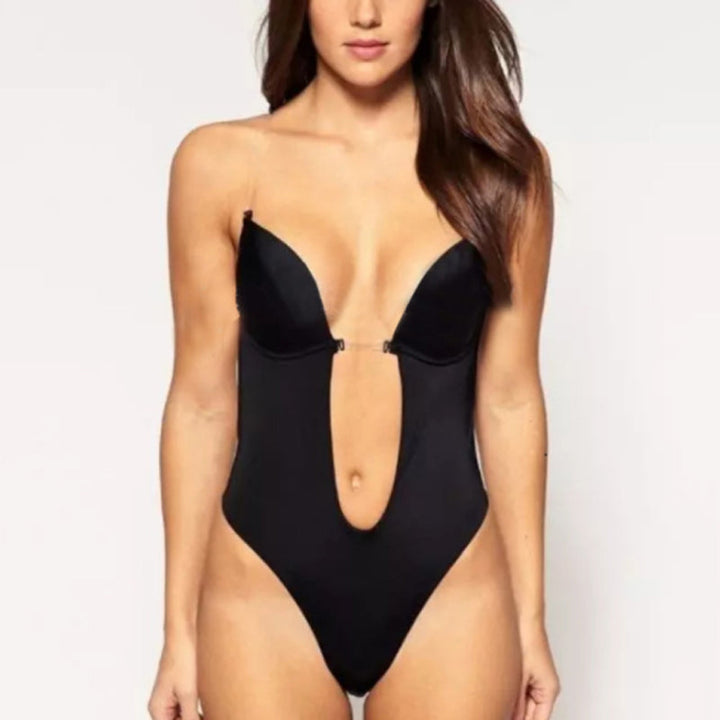 "Sömlöst dam shapewear, låga skärningar, formande design, justerbara axelband, vit färg, nylonblandning för komfort."