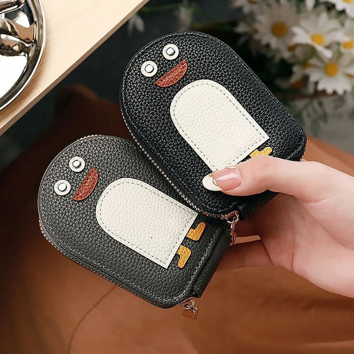 "Söt damplånbok i PU, pingvinmotiv, för kort/mynt. Ladies' accessory, kompakt och stilsäker med dragkedja."