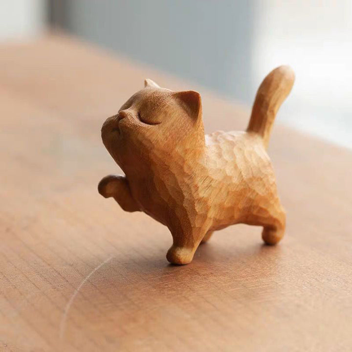 "Söt handgjord träkatt skulptur 5cm, elegant linjer, detaljarbete i buxbom, perfekt dekorationsaccessoar."