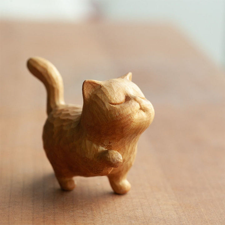 "Söt handgjord träkatt skulptur 5cm, elegant linjer, detaljarbete i buxbom, perfekt dekorationsaccessoar."