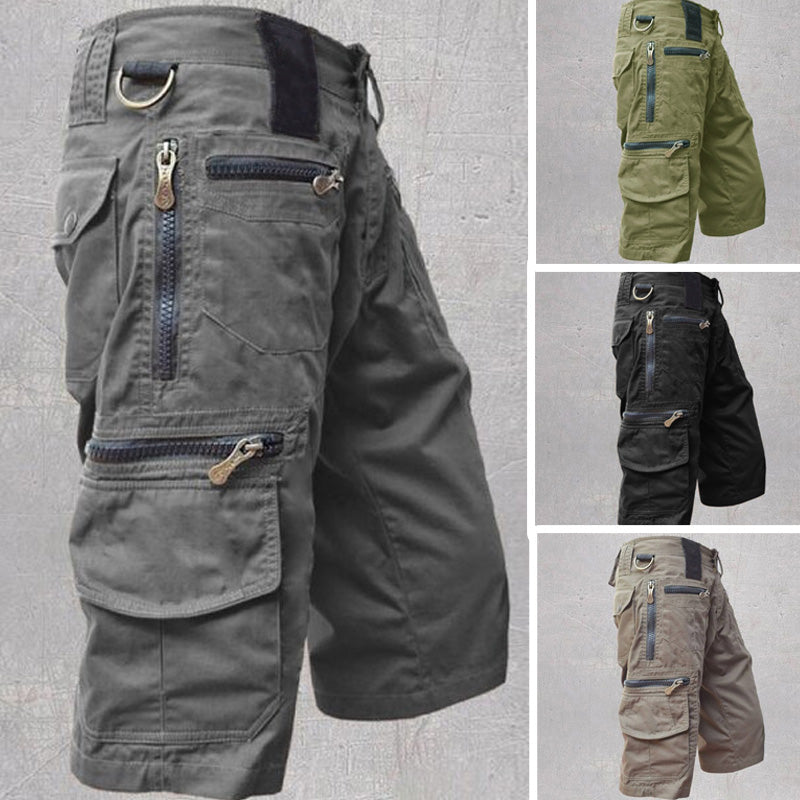 "Stilrena mörkgrå herr capri cargo shorts med många fickor, elastisk midja och modern design för utomhusaktiviteter."
