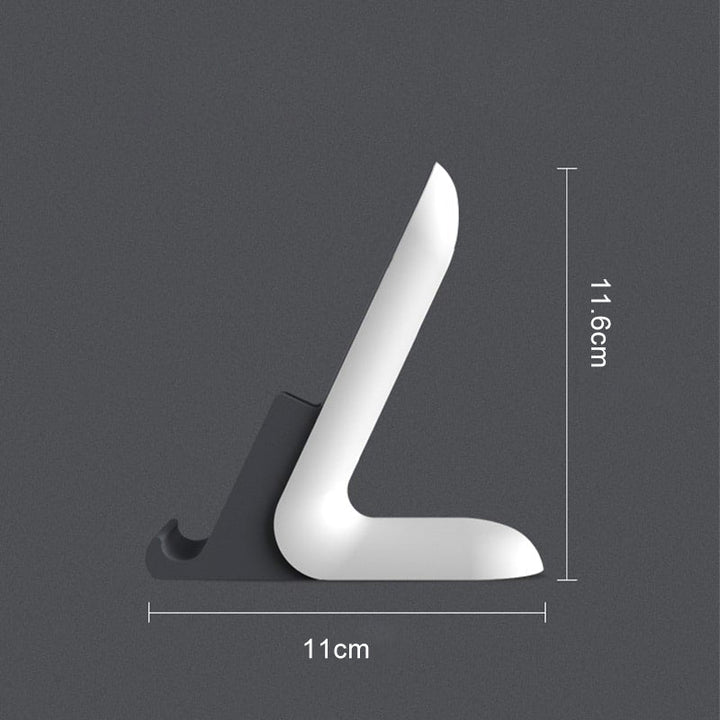 "Stilrent telefonställ i ABS och silikon för snabb laddning och kabelorganisation, perfekt för iPhone och Android-enheter."