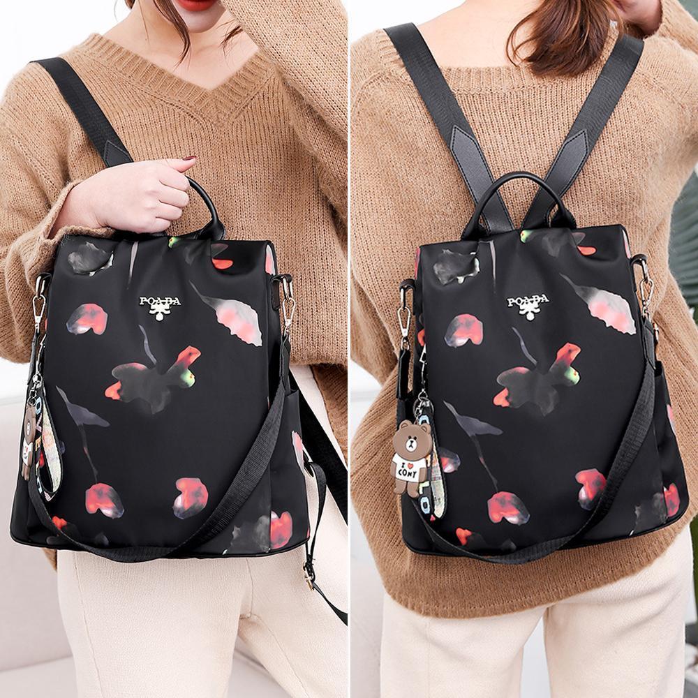 "Stöldsäker damryggsäck med fjärilsmönster, stor kapacitet, Oxford- och polyestertyg, mångsidiga fickor, justerbara remmar."