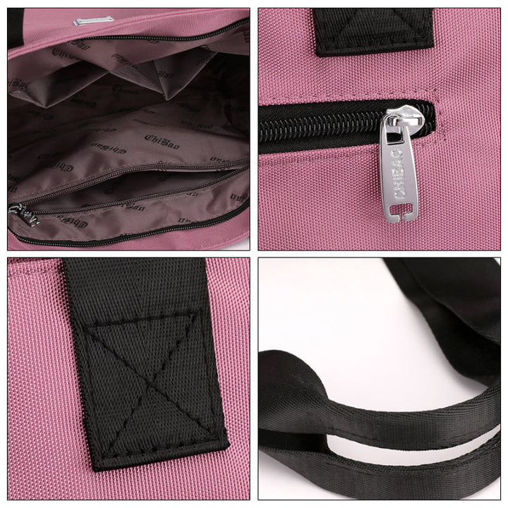 "Stor nylon damväska med flera fickor och dragkedja, svart färg, rymlig design, handtag 27 cm."