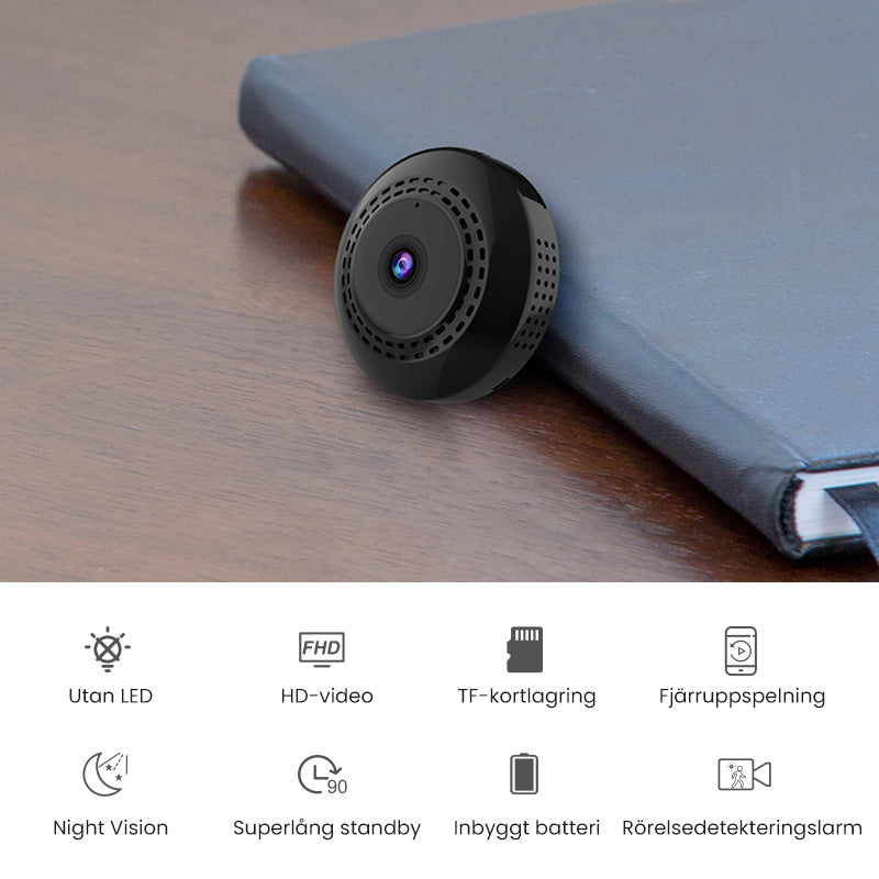 Svart mini WiFi-kamera för hem och bil, kompakt design, högupplöst video, night vision, magnetisk bas för enkel placering.