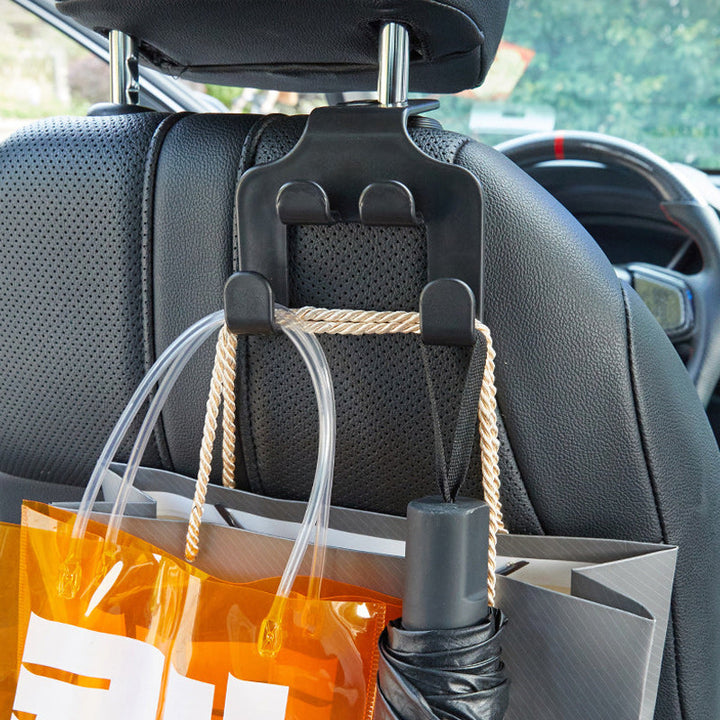 "Svart multifunktionell mobiltelefonhållare för bil med elegant design och hållbart ABS-material, enkel montering."