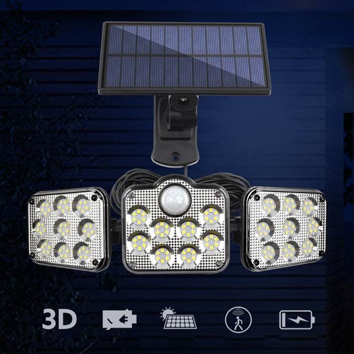 "Trippel LED solcellsvägglampa för utomhusbruk, modern design med sensor. Energieffektivt ljus för säker belysning."