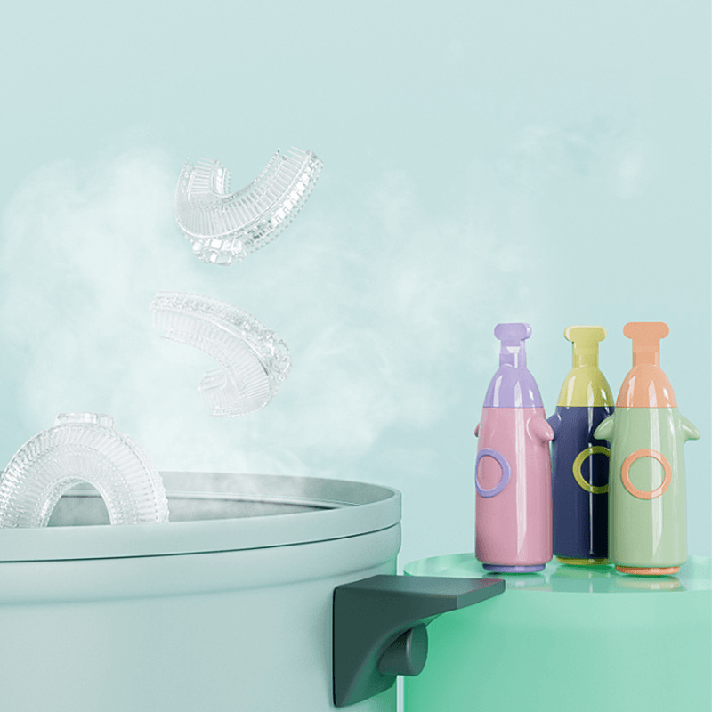 "U-formad manuell tandborste för barn i färgglad design med 360° rengöring, tillverkad i säker silikon för god munhygien."