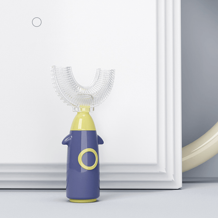 "U-formad manuell tandborste för barn i färgglad design med 360° rengöring, tillverkad i säker silikon för god munhygien."