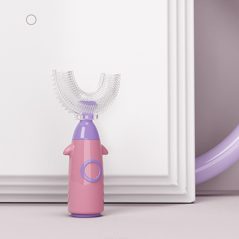 "U-formad manuell tandborste för barn i färgglad design med 360° rengöring, tillverkad i säker silikon för god munhygien."