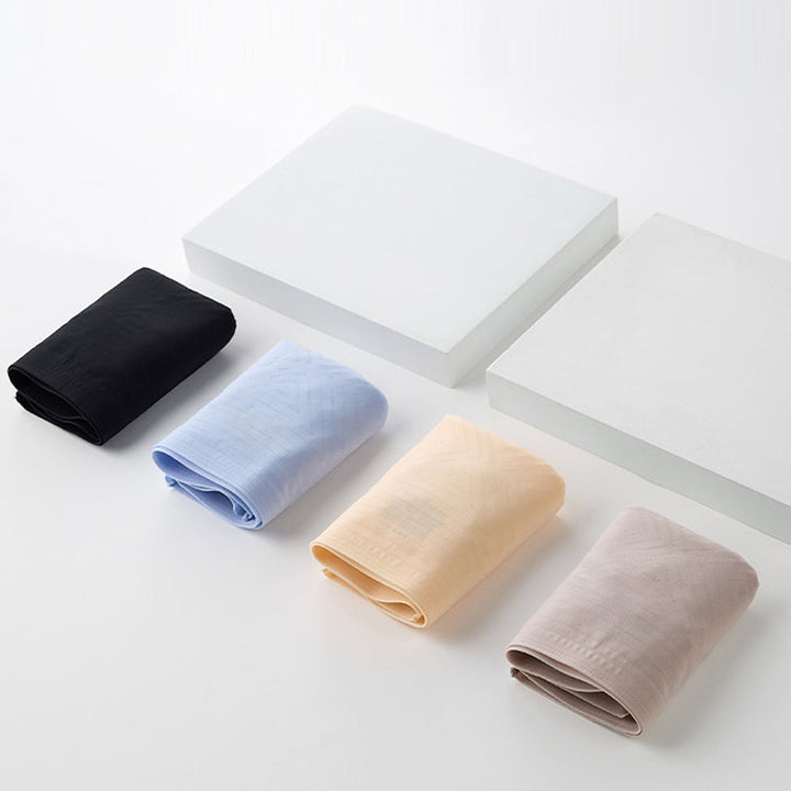 "Ultraslimma höjande trosor, hög midja, i beige, ger magkontroll och sömlös passform för en elegant siluett."