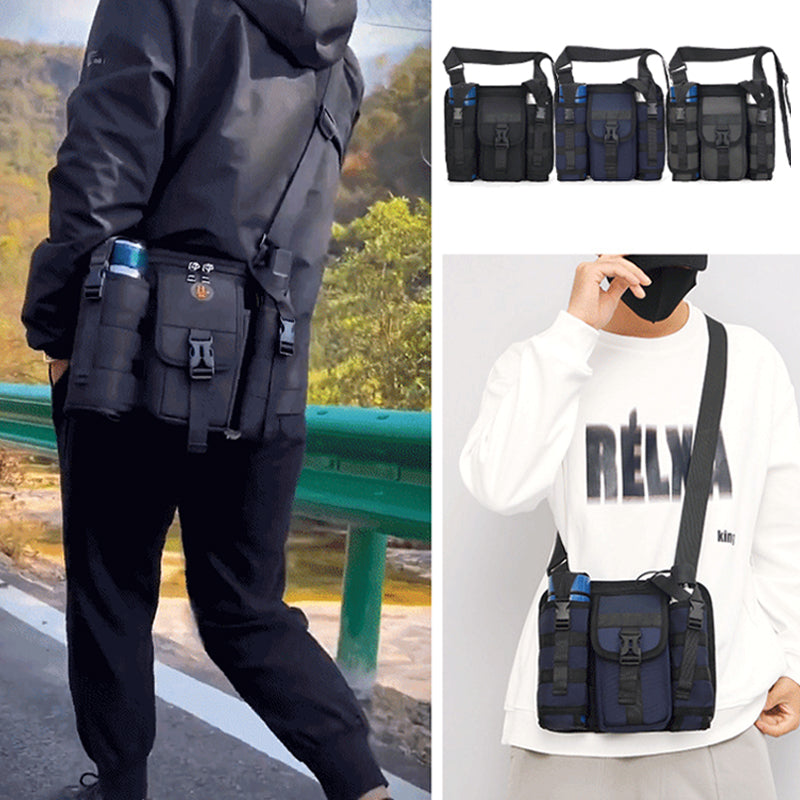 Unisex crossbody axelväska i tåligt tyg, grå. Framifrån med dragkedjor och justerbar rem, perfekt för organiserad förvaring.