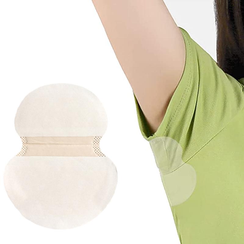 "Unisex svettabsorberande underarmsdynor, miljövänliga, vita och självhäftande, håller dig torr och bekväm hela dagen."