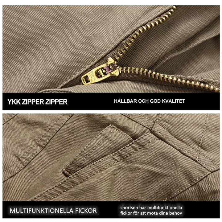 "Vattentåliga herrvandrarshorts med flera fickor, elastiskt midjeband och förstärkt tyg i grön färg, främre vy."