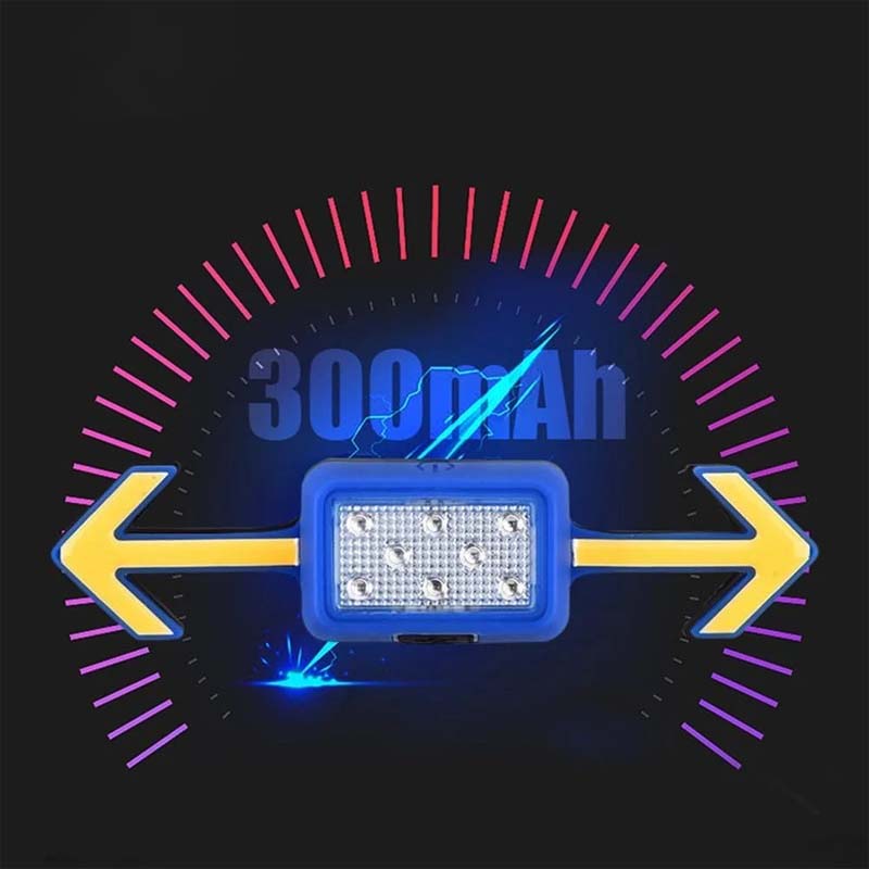 "Vattentät cykelblinkerslampa med fjärrkontroll, röd och svart, monterad på hjälm för optimal säkerhet och synlighet."