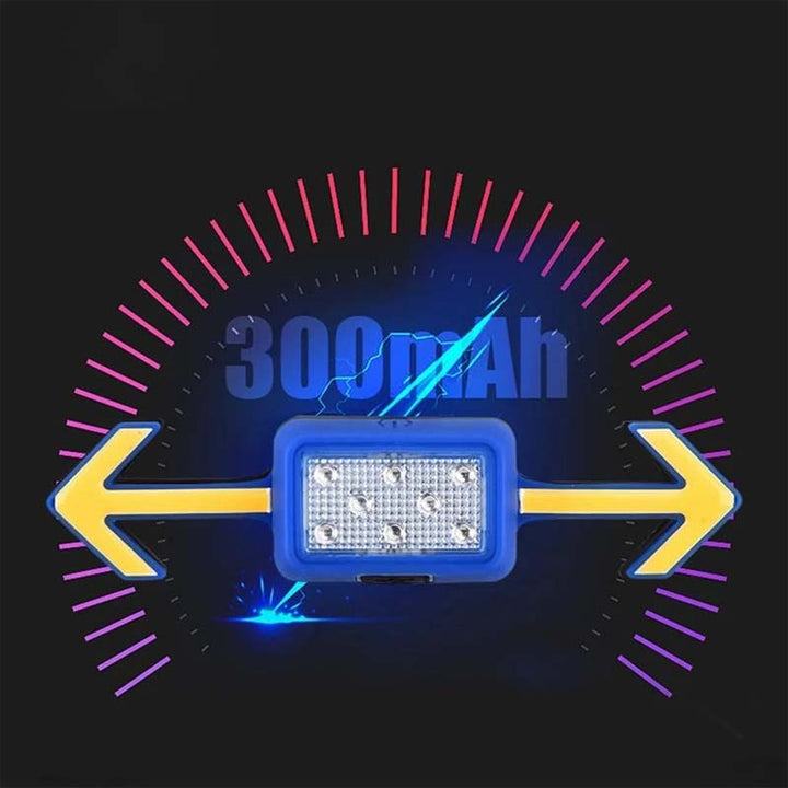 "Vattentät cykelblinkerslampa med fjärrkontroll, röd och svart, monterad på hjälm för optimal säkerhet och synlighet."