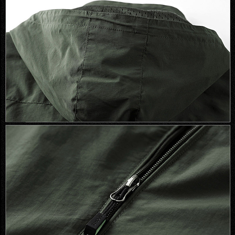 "Vattentät utomhus herrjacka i armégrönt, vindtät, med dragkedja och fickor, perfekt för äventyr i naturen."