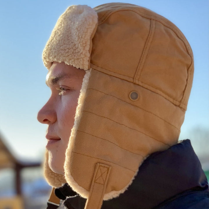 Vintermössa i fleece med öronskydd för herr och dam, varm och trendig, finns i brun, grön, marinblå och svart.