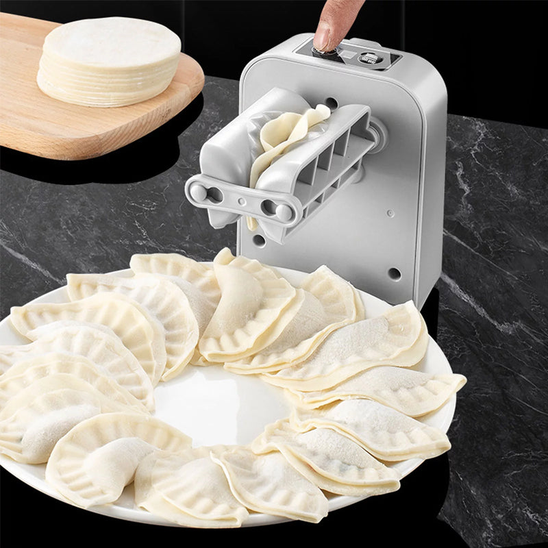"Vit elektrisk dumplingsmaskin i modern design, USB-uppladdningsbar, köksprodukt för snabb och enkel dumplingstillverkning."