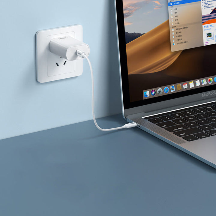 "Vit och blå mini multifunktionell förvaringsbox för digitala prylar med flera kablar och inbyggt telefonställ."